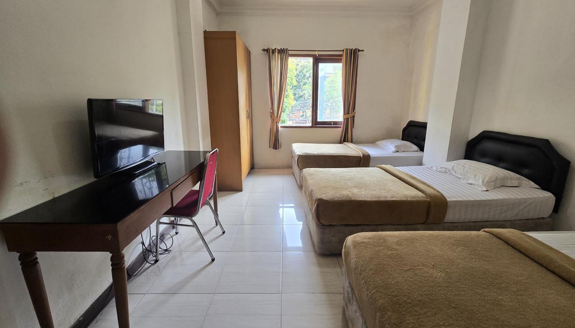 Hotel Maxim Kwitang Джакарта Номер фото