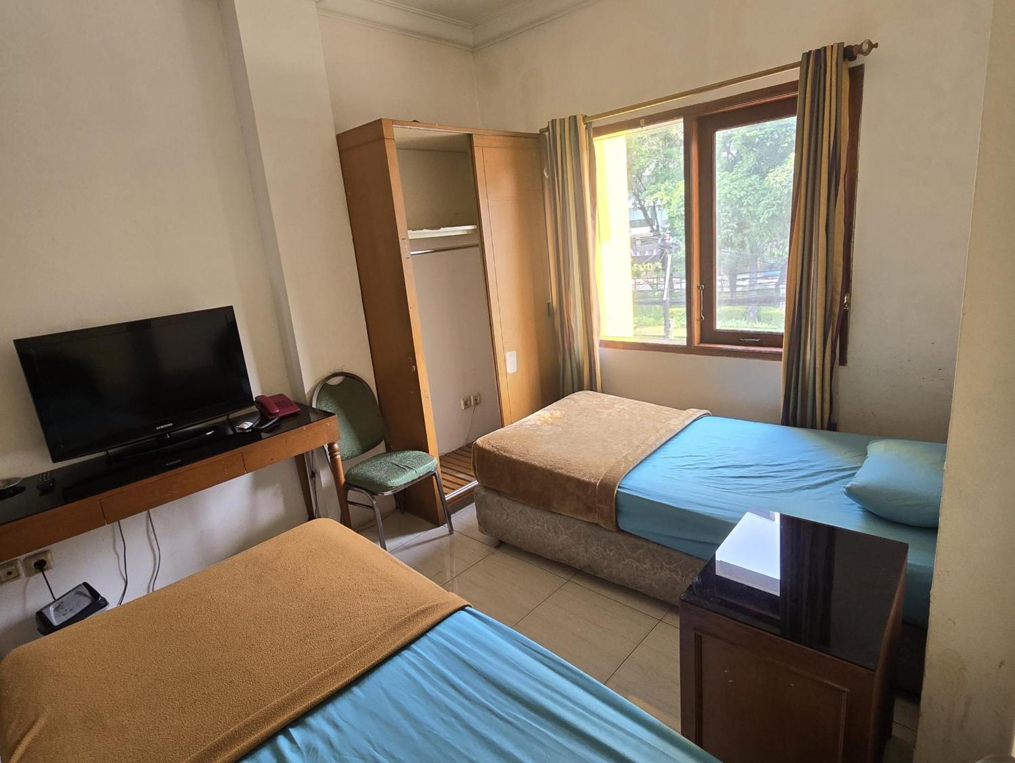 Hotel Maxim Kwitang Джакарта Номер фото